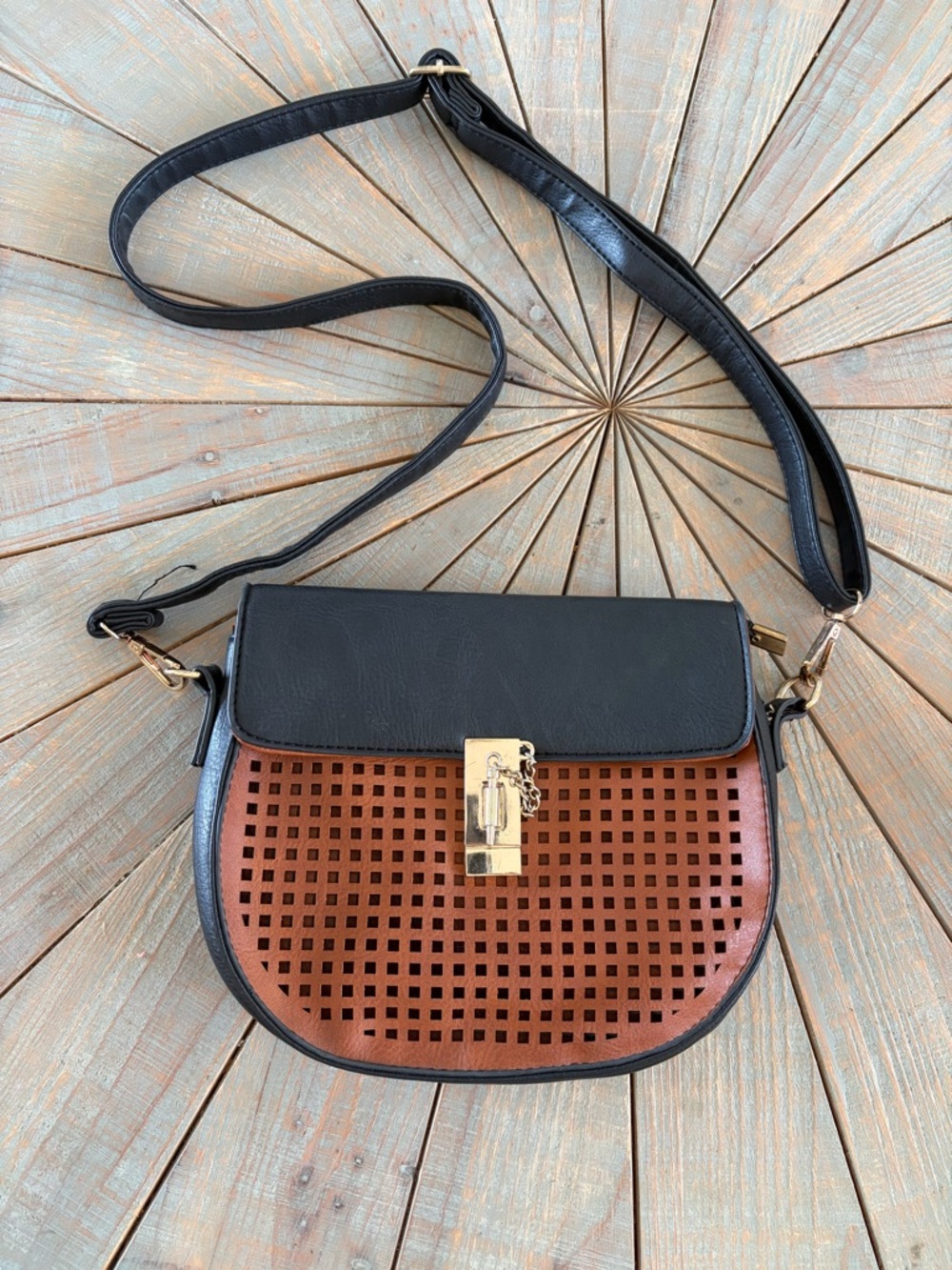 Brown & Black Crossbody adjustable Shoulder bag with laser cut detail.